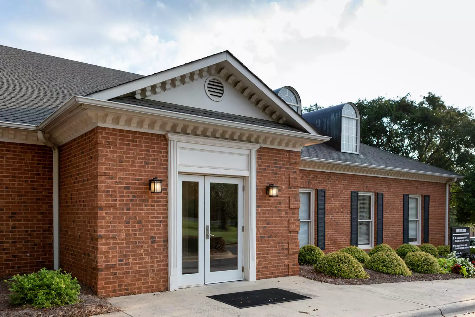 The exterior of the Coleman & Dastrup Dental office at 460 S Main St in Davidson, NC